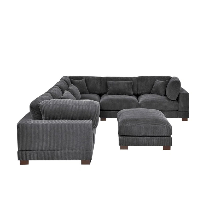 Arliz 7 - Piece 144" Wide Reversible Modular Corner Sectional with Ottoman